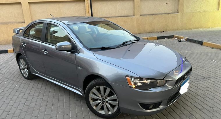 ميتسوبيشي لانسر شارك موديل ٢٠١٦ فضي
