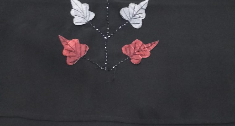 عباية سوداء وجهين أنيقة