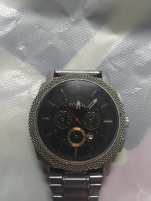 ساعه فوسيل وساعه فوسيل اخري